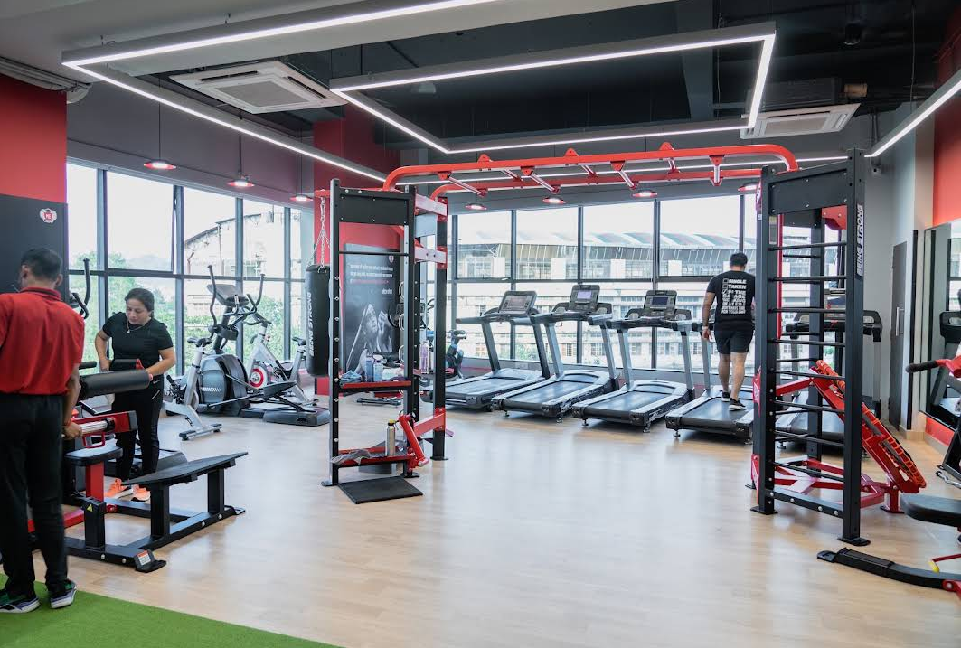 Cardio deck with commercial treadmills and monkey bars