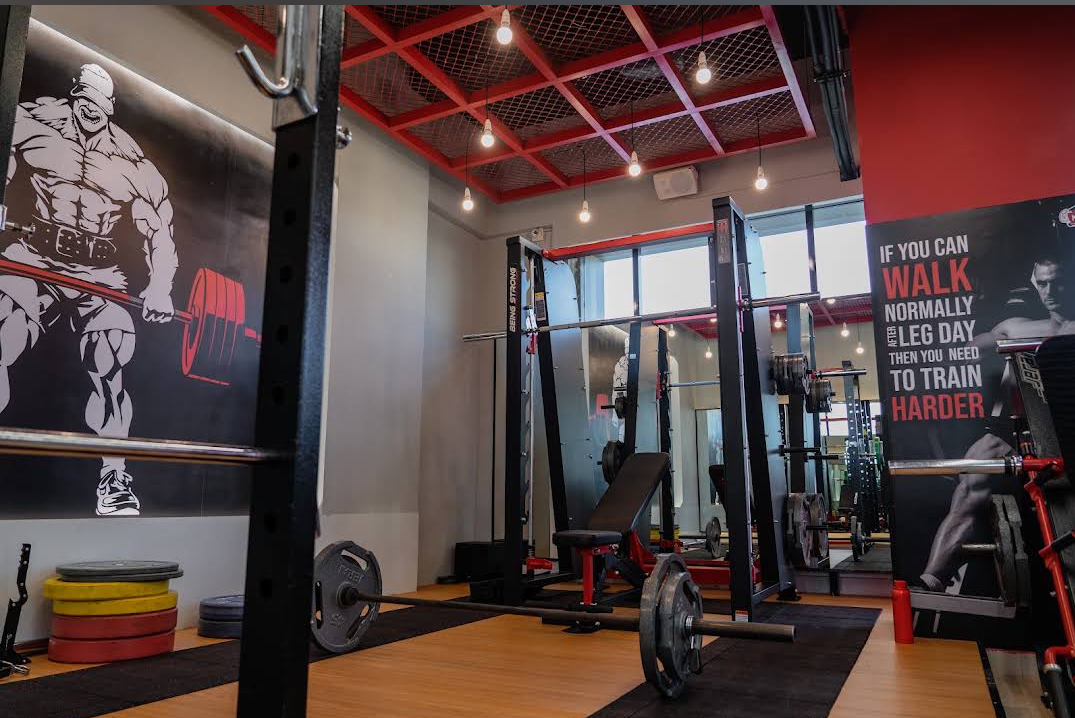 Deadlift platform and power cage with motivational wall graphics